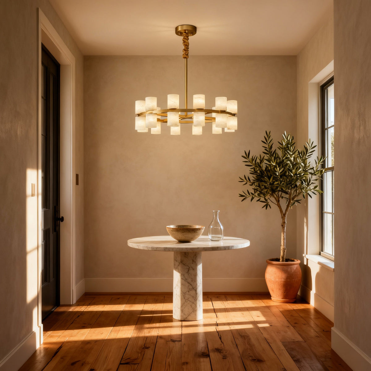 Enzo chandelier over a marble breakfast table, room scene