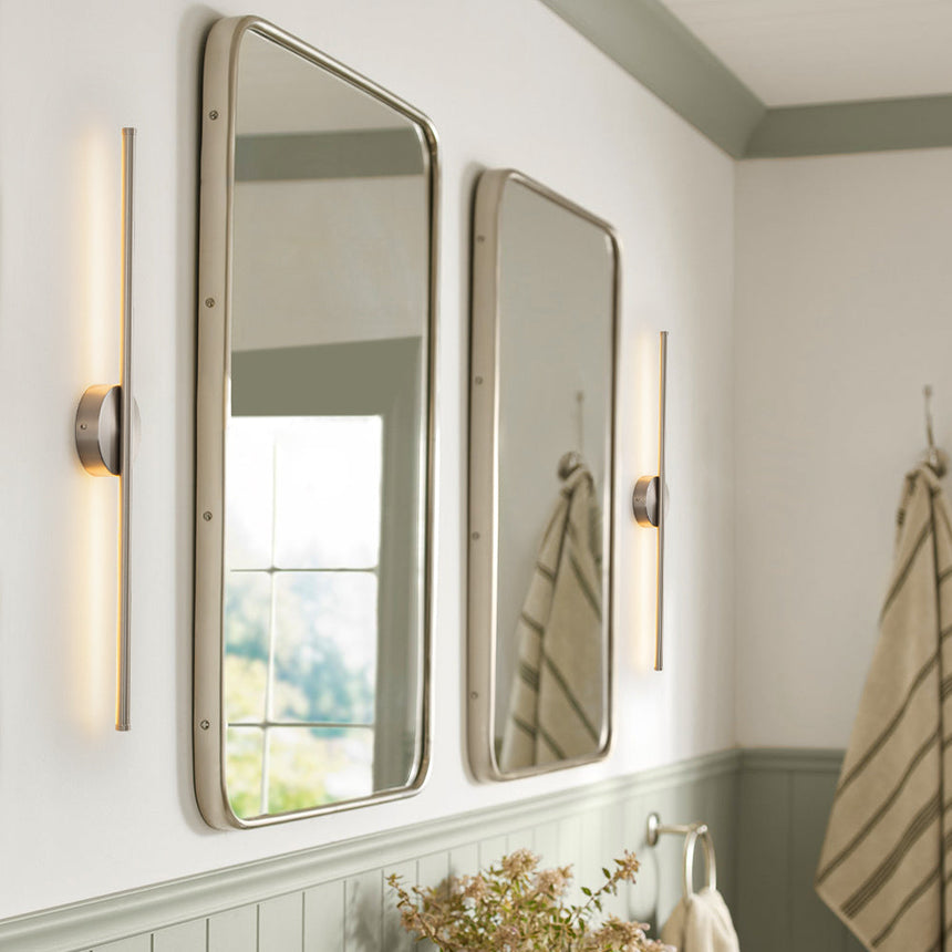 Contemporary cylinder wall sconce with soft downward warm light