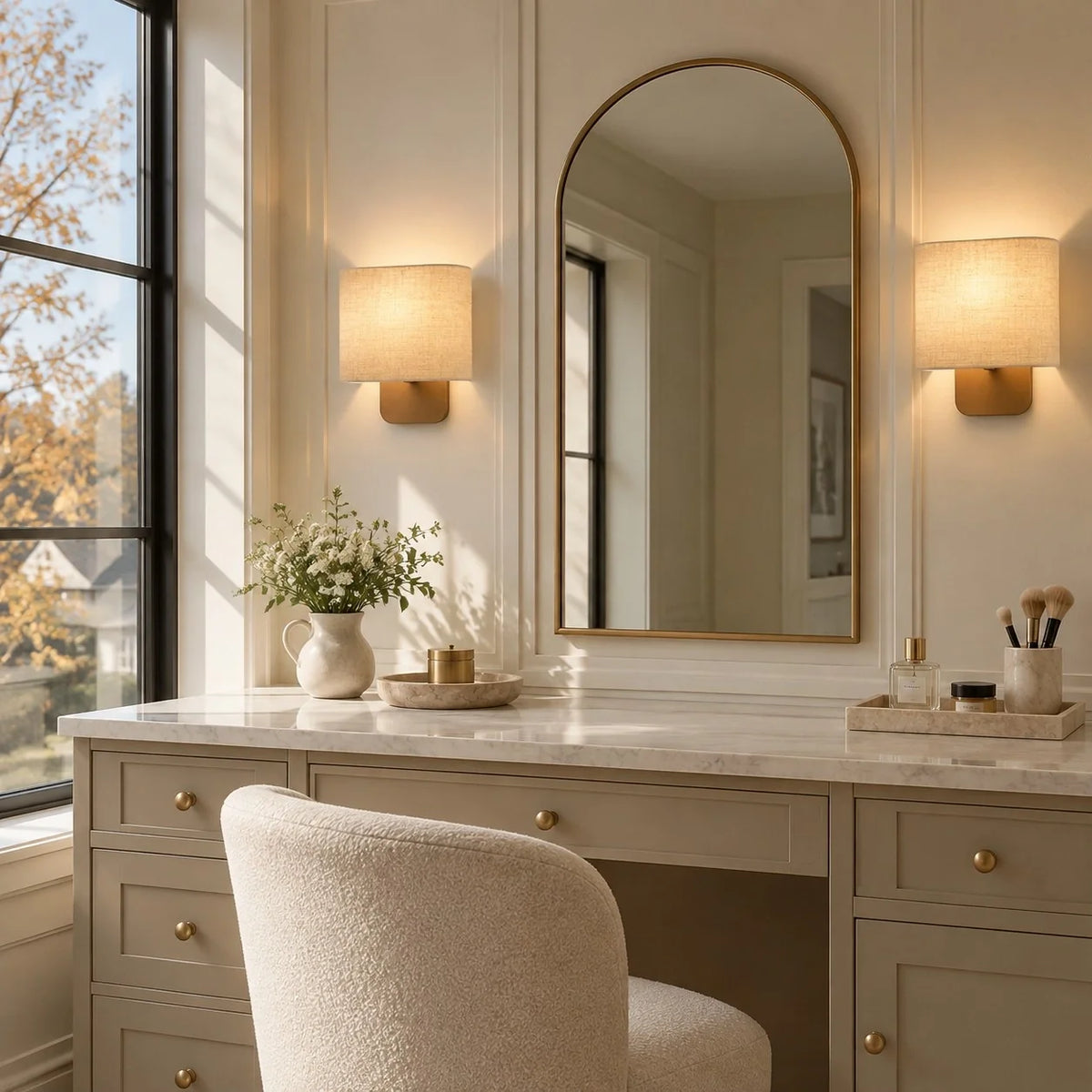 Maris sconce pair at a vanity mirror