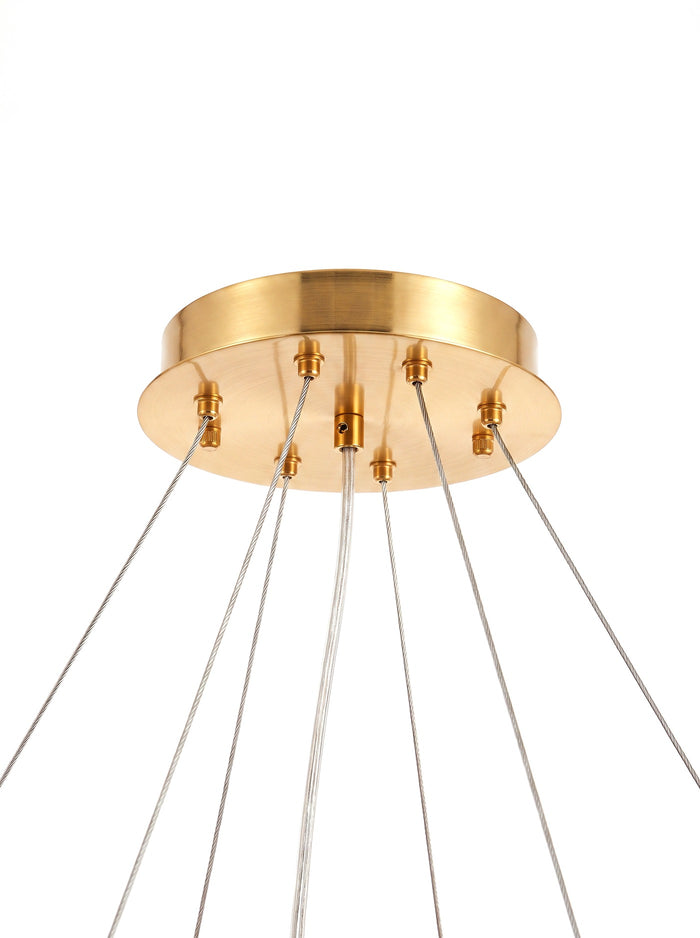 Close-up of the gold ceiling canopy and suspension cables