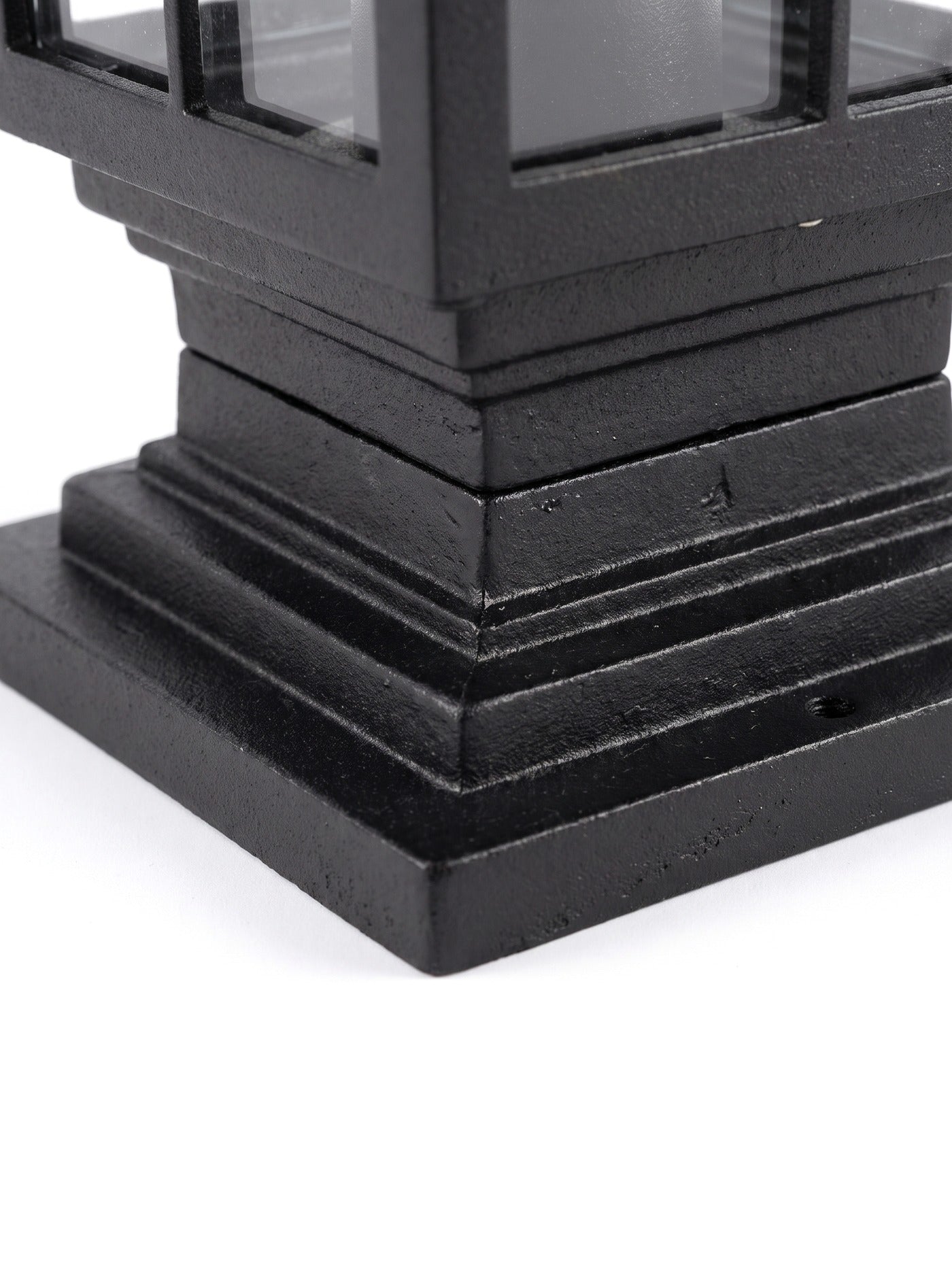 Close-up of the stepped cast base plate