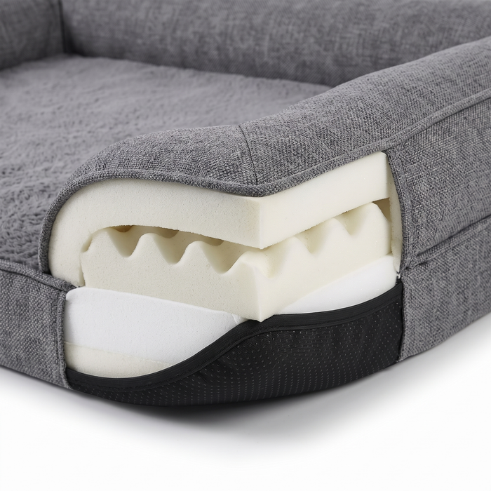 Cove dog bed memory foam layers and non-slip base, close-up on white
