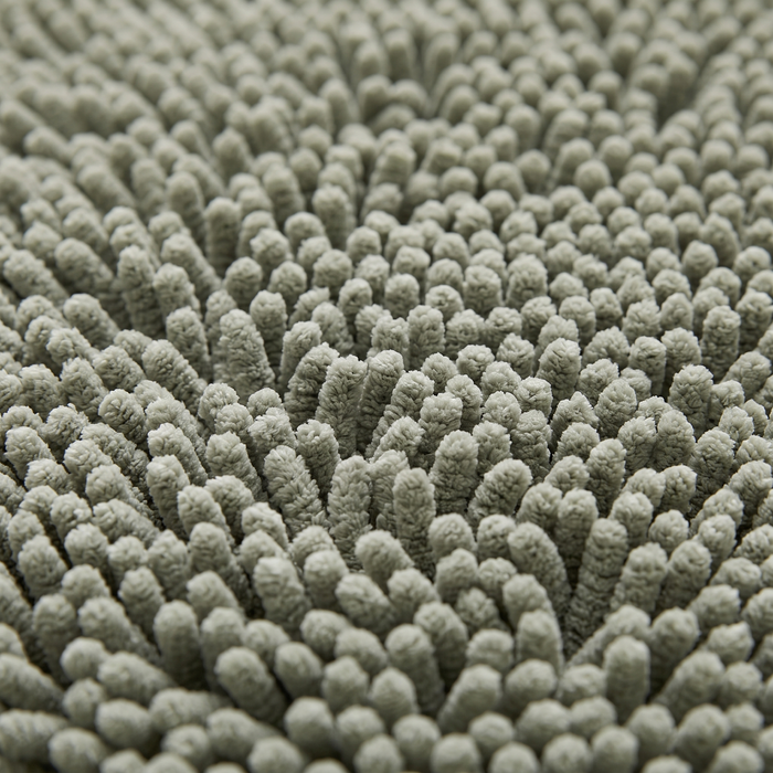 Pebble chenille shag pile texture, close-up on white