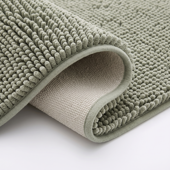 Pebble bath mat non-slip backing, close-up on white