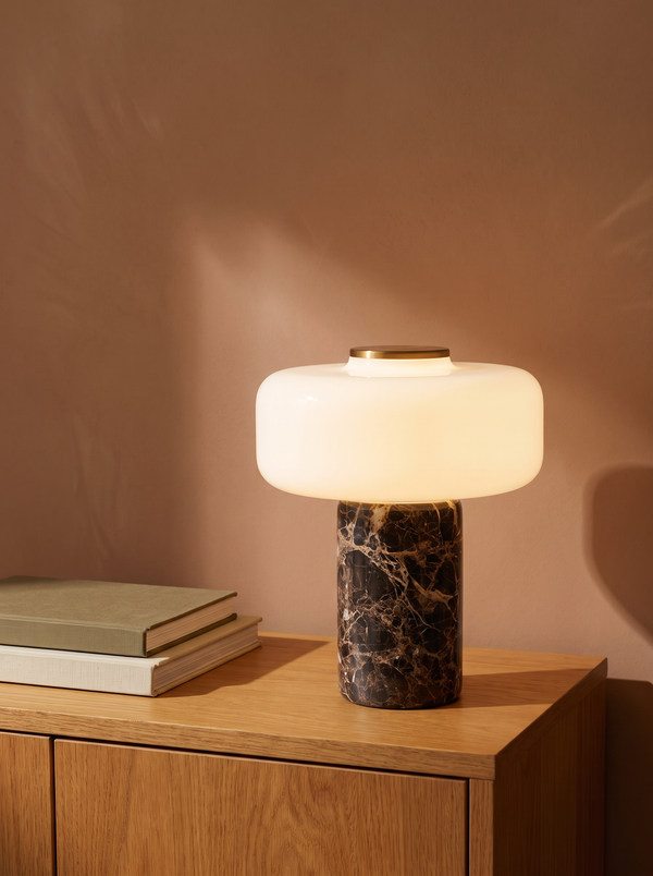 Dessa marble rechargeable table lamp on an oak console against a warm plaster wall