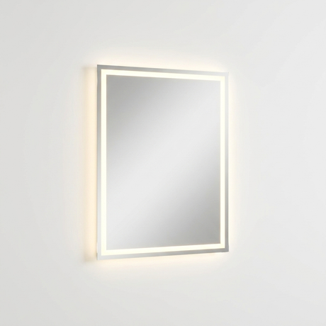 LED bathroom mirror with backlit and front-lit illumination above a vanity