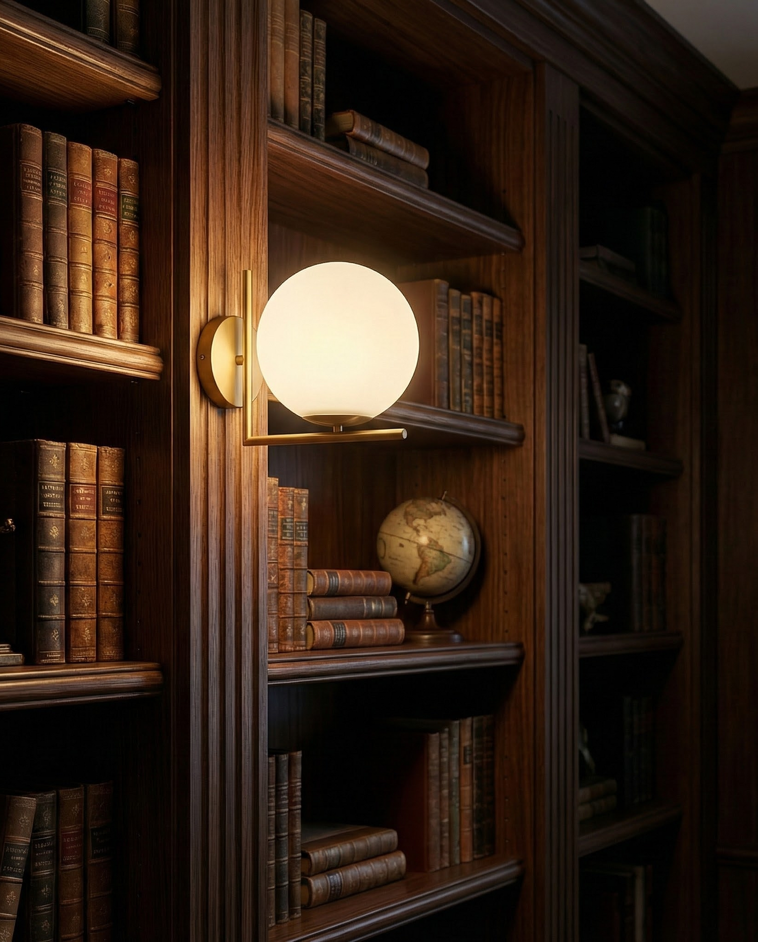 DaraLight globe sconce in a wood-paneled library, room scene