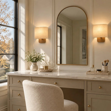 Maris sconce pair at a vanity mirror