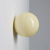 Oria pastel glass wall sconce in light yellow