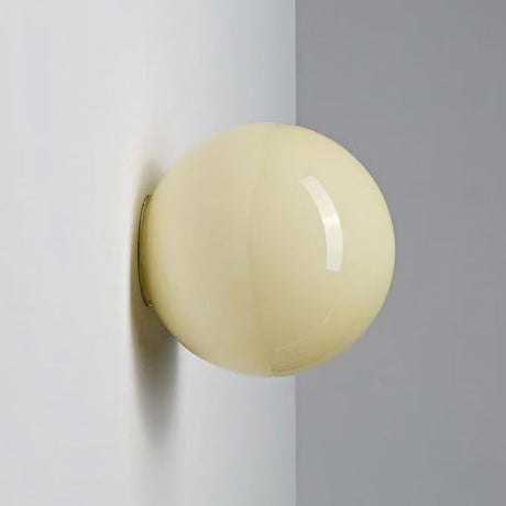 Oria pastel glass wall sconce in light yellow