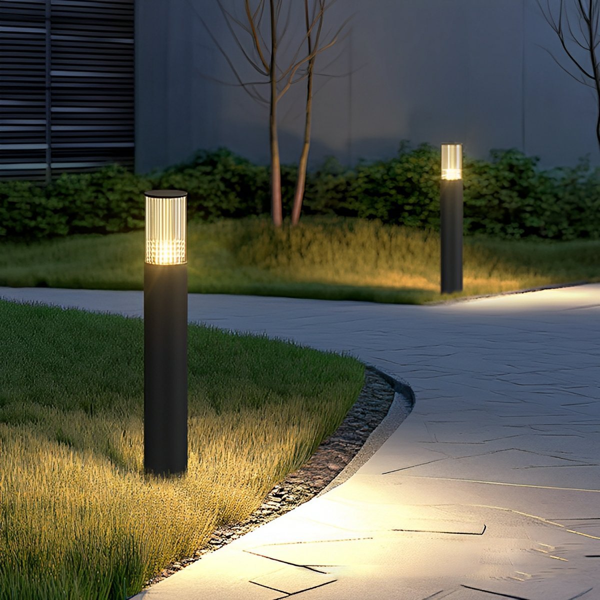 Tove garden bollard lights along a modern path