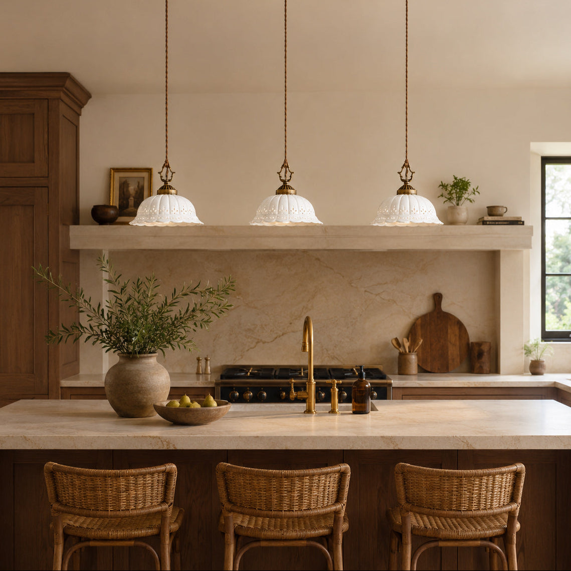 Anita three-head ceramic pendants over a kitchen island — lifestyle