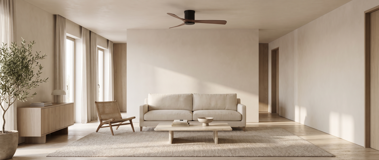 Vane wood ceiling fan in a warm minimalist living room — lifestyle