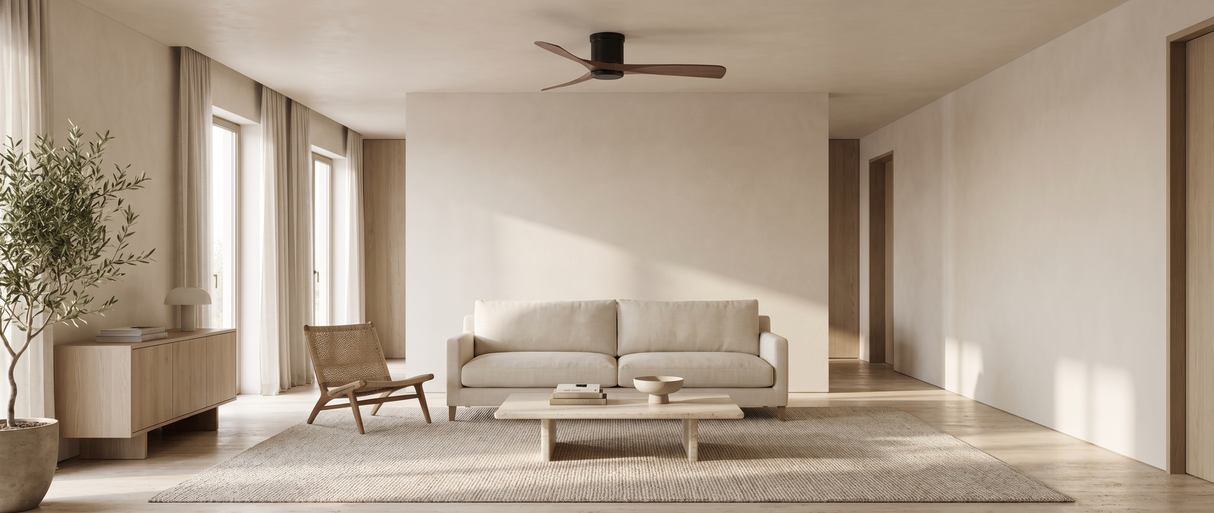 Vane wood ceiling fan in a warm minimalist living room — lifestyle