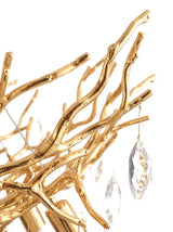 Close-up of the cast gold branch frame