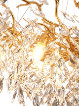 Close-up of a warm candle bulb glowing among the crystals