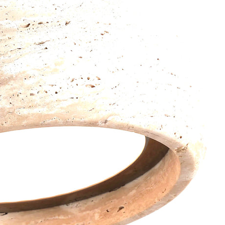 Anello honed travertine stone texture, macro close-up on white