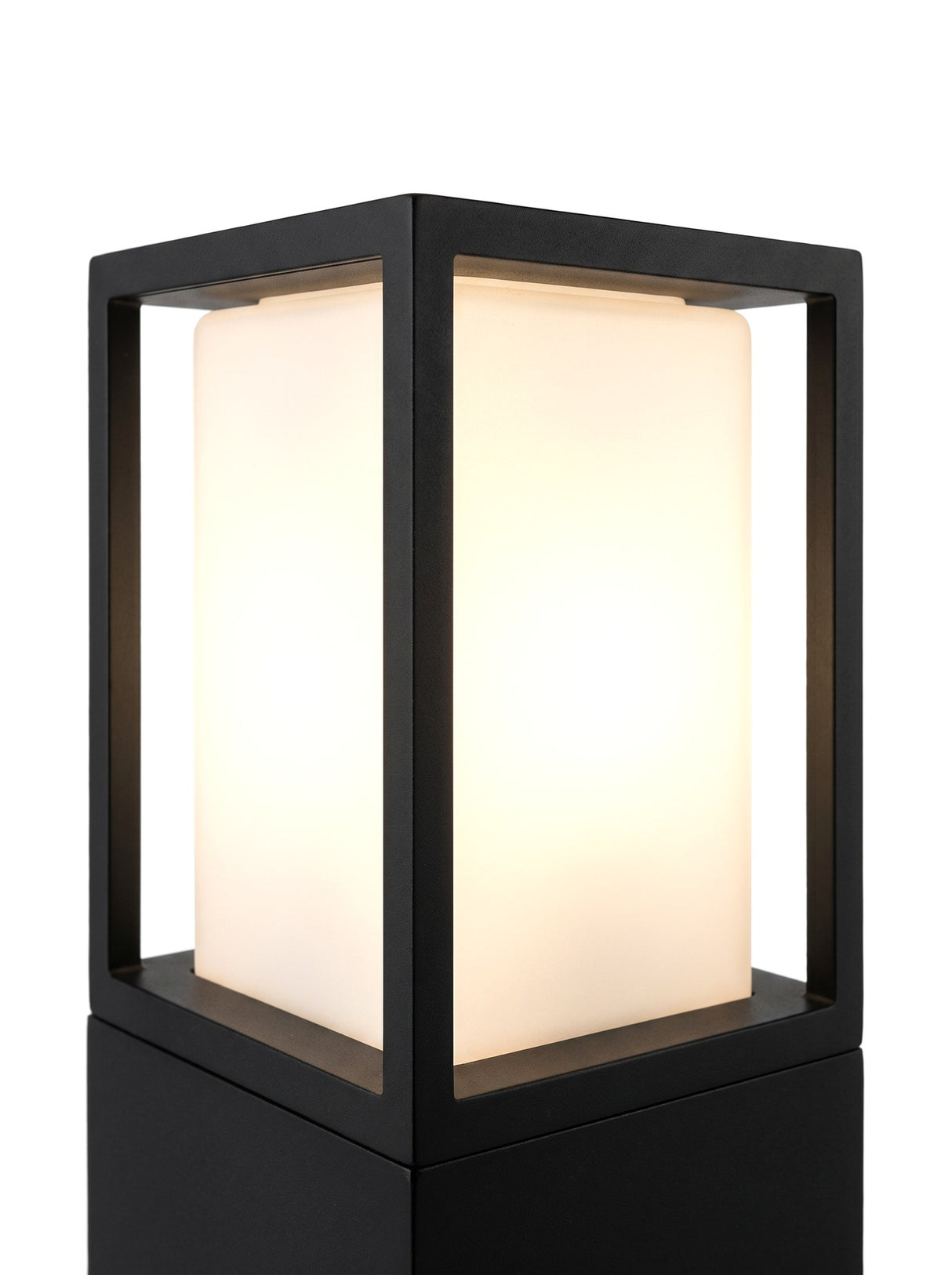 Close-up of the frosted-white diffuser head glowing warm