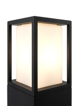 Close-up of the frosted-white diffuser head glowing warm