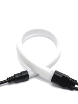 Filo strip bent around a tight radius with waterproof connector, close-up on white
