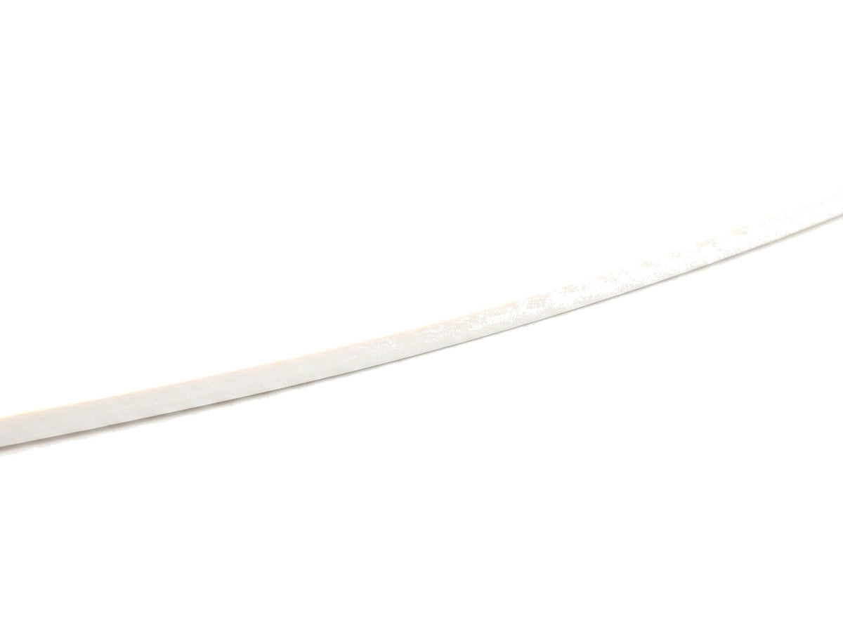 Filo strip lit with smooth even warm glow, on white