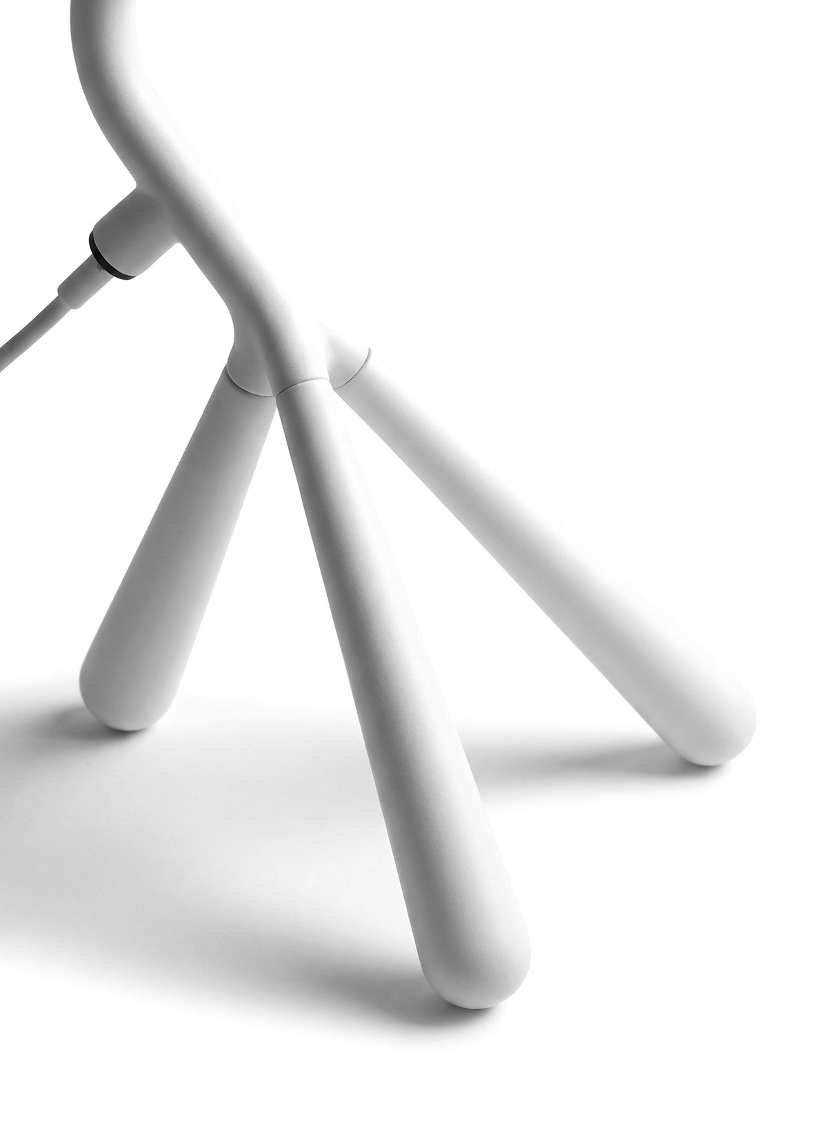 Close-up of the three splayed tripod legs