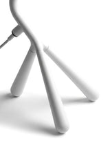 Close-up of the three splayed tripod legs