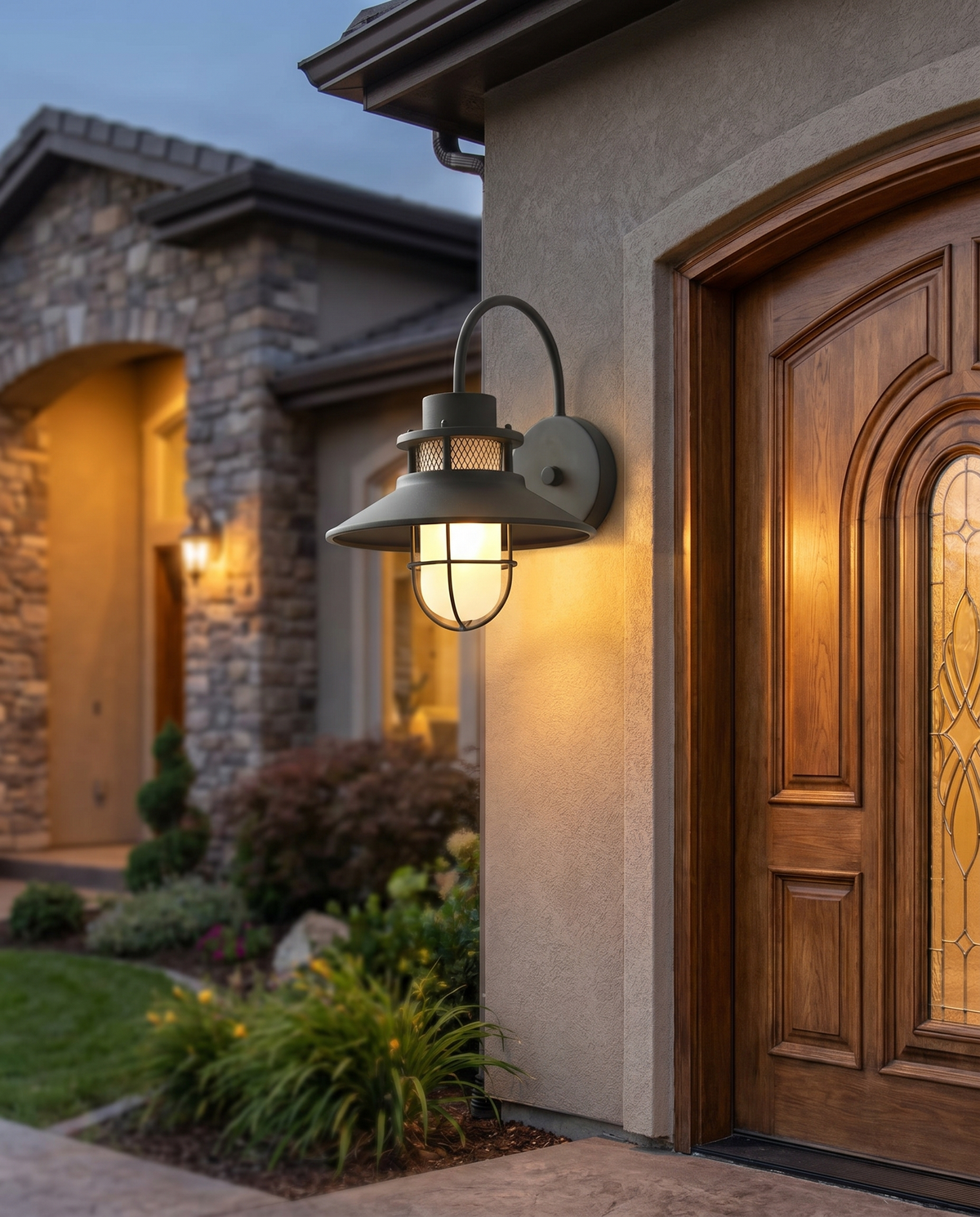 Outdoor wall lantern beside entrance at dusk, lifestyle