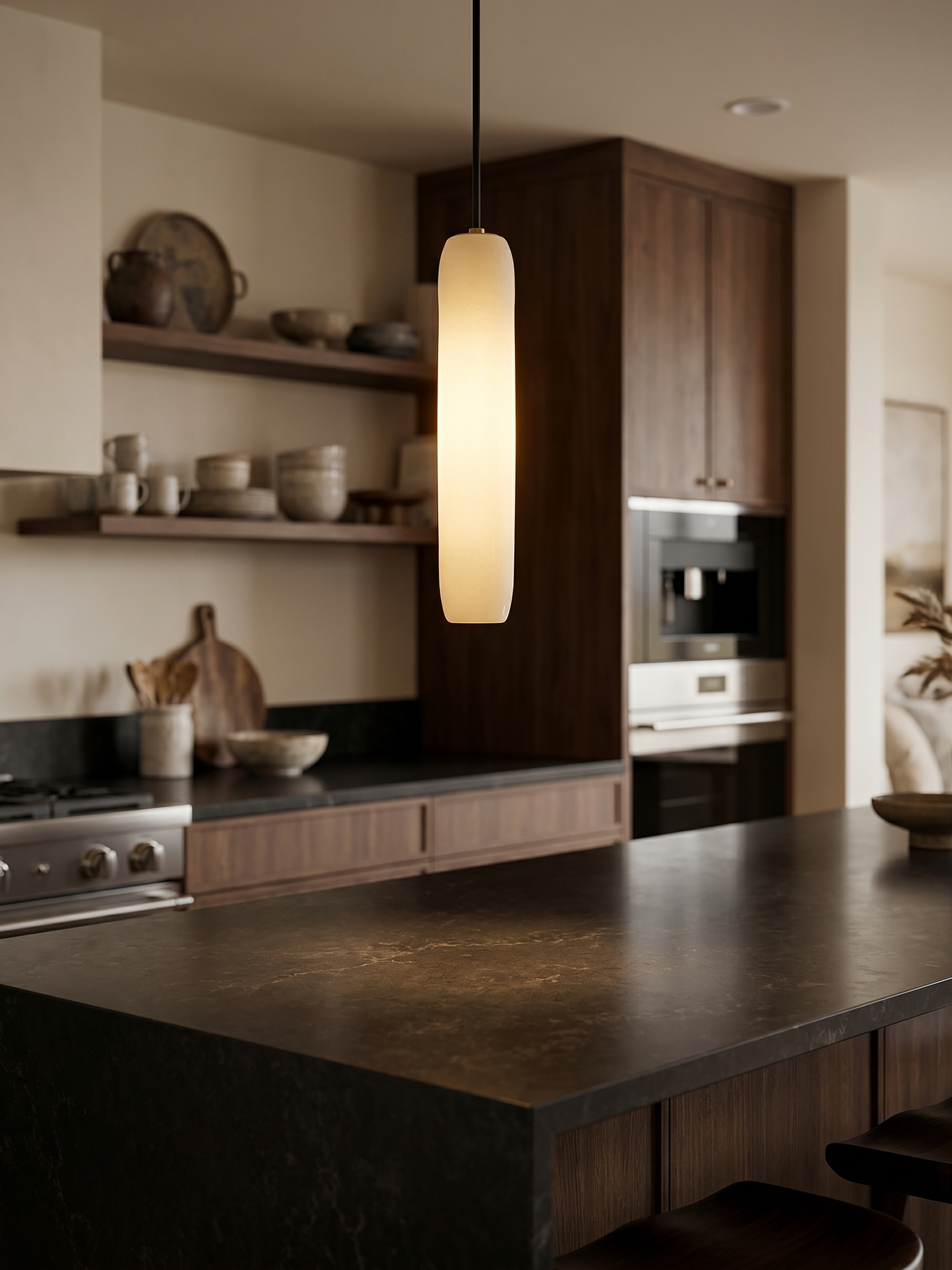 Glass pendant light over kitchen island, lifestyle