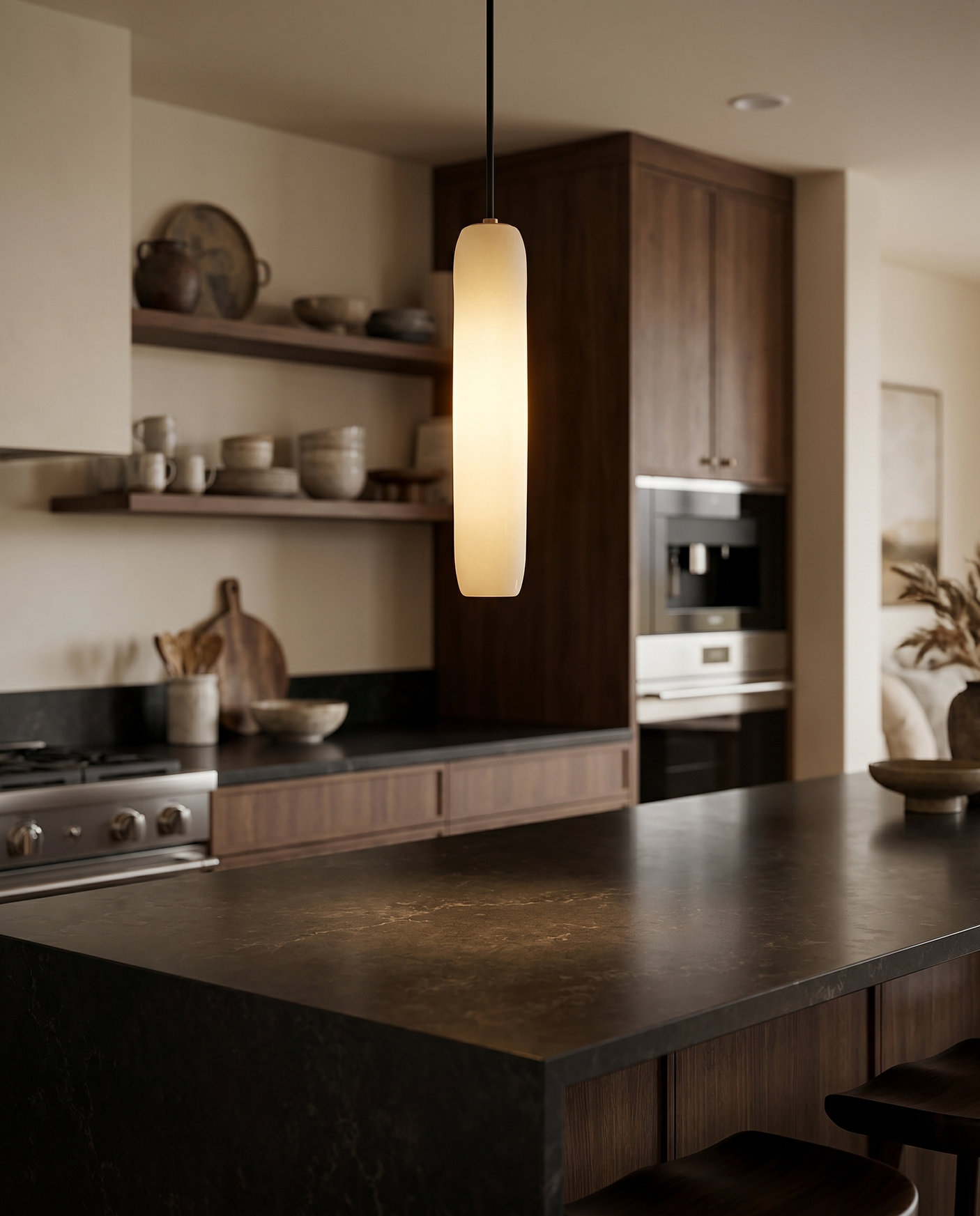 Glass pendant light over kitchen island, lifestyle