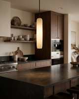 Glass pendant light over kitchen island, lifestyle