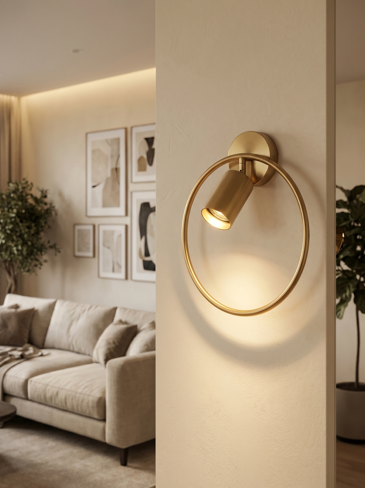 Sculptural brushed-gold wall sconce, lifestyle
