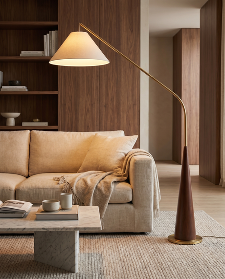 Arc floor lamp with wooden base over sofa, lifestyle