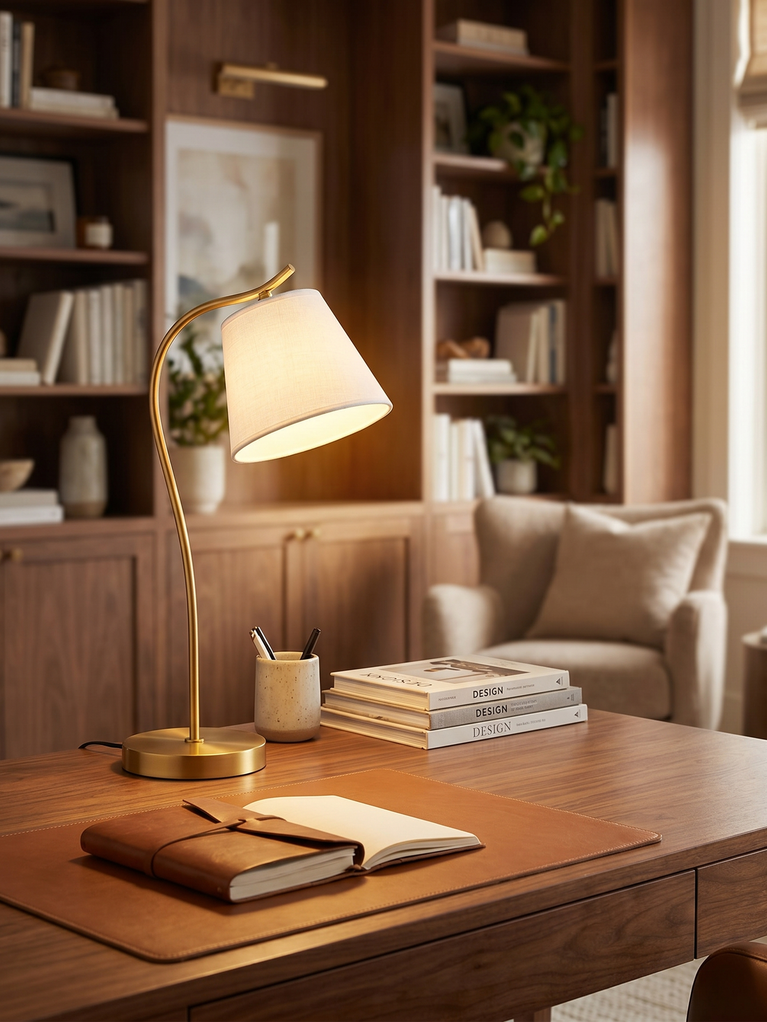 Gooseneck desk lamp on home office desk, lifestyle