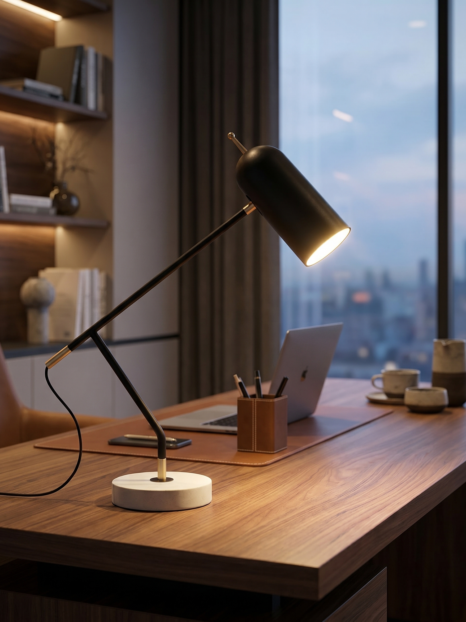 Black minimalist desk lamp on desk, lifestyle