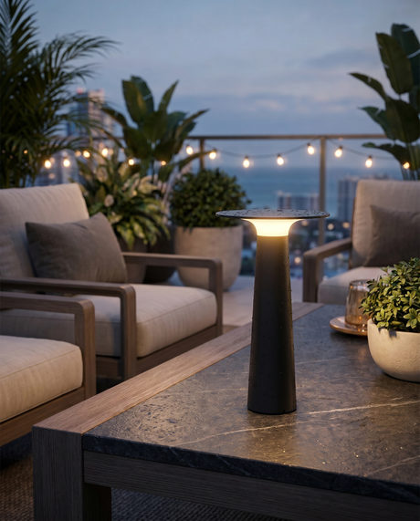 Waterproof outdoor LED table lamp on patio table, lifestyle