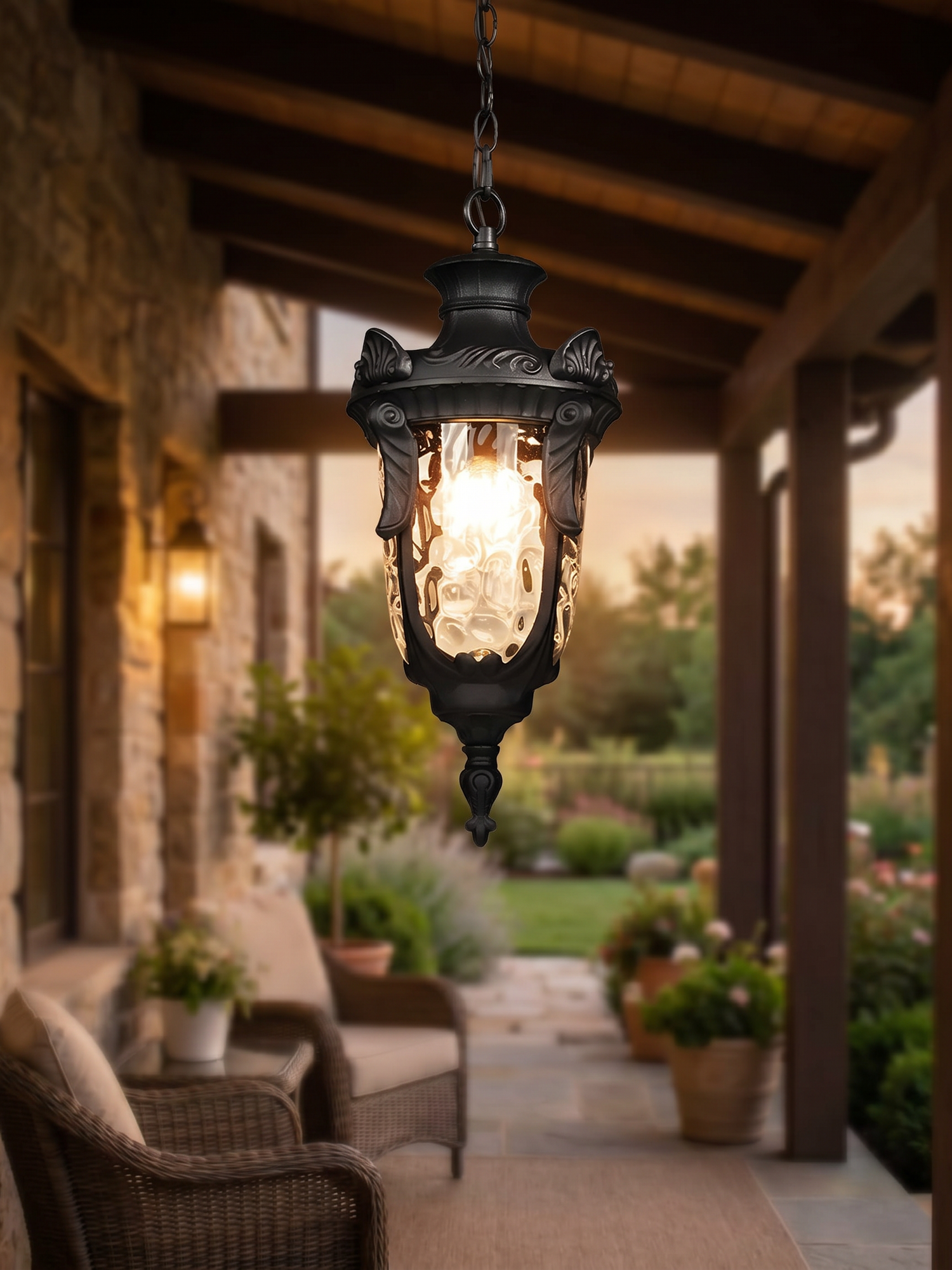 Rustic outdoor hanging lantern pendant on porch, lifestyle