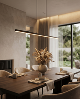 Up-down linear LED pendant over dining table, lifestyle