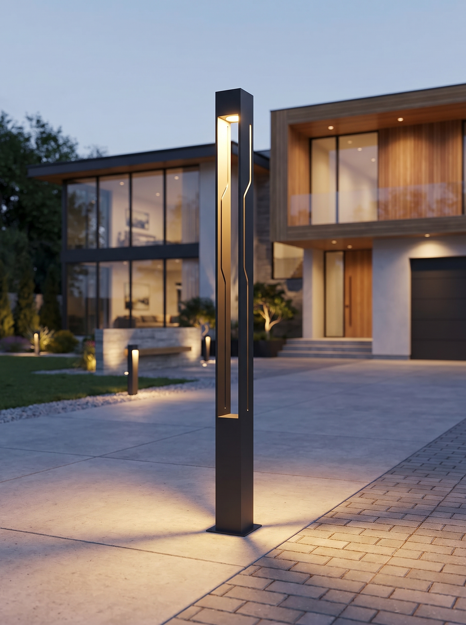 Ash-black rectangle LED pole light along driveway, lifestyle