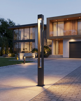 Ash-black rectangle LED pole light along driveway, lifestyle