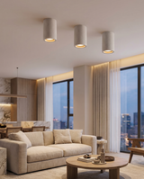 Round concrete LED ceiling light in living room, lifestyle