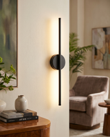 LED wall sconce with dimmable 3000K warm light and slim cylinder design for cozy home lighting
