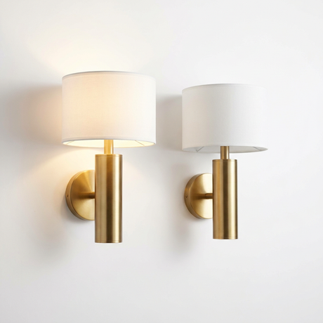 Cordless sconce with warm light on, studio shot