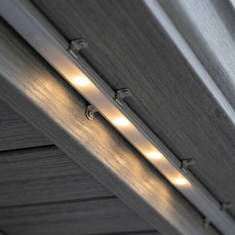 Close-up of the LED track installed under a roof soffit