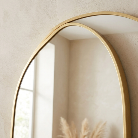 Close-up of the slim gold aluminum frame and glass edge