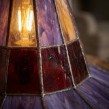 Close-up of the glowing stained glass panel detail