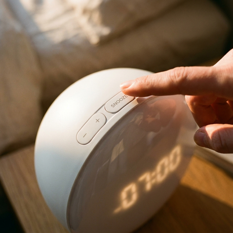 Close-up of the top touch controls and snooze