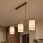 Three-quarter angle of the alabaster linear chandelier frame