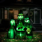 Inflatable cauldron glowing green on a lawn at night