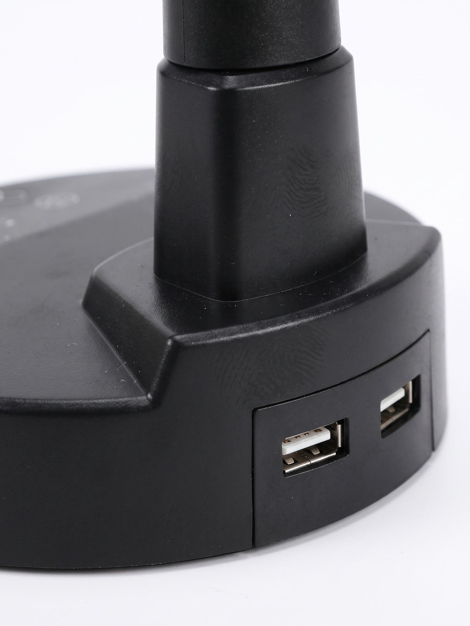 Lume weighted base with USB charging ports, close-up